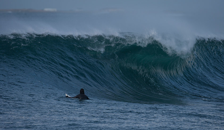 Sam Hammer looking into a cold Icelandic slab. Photo: <a href=\"https://www.reposarphoto.com\">Jason Reposar</a>