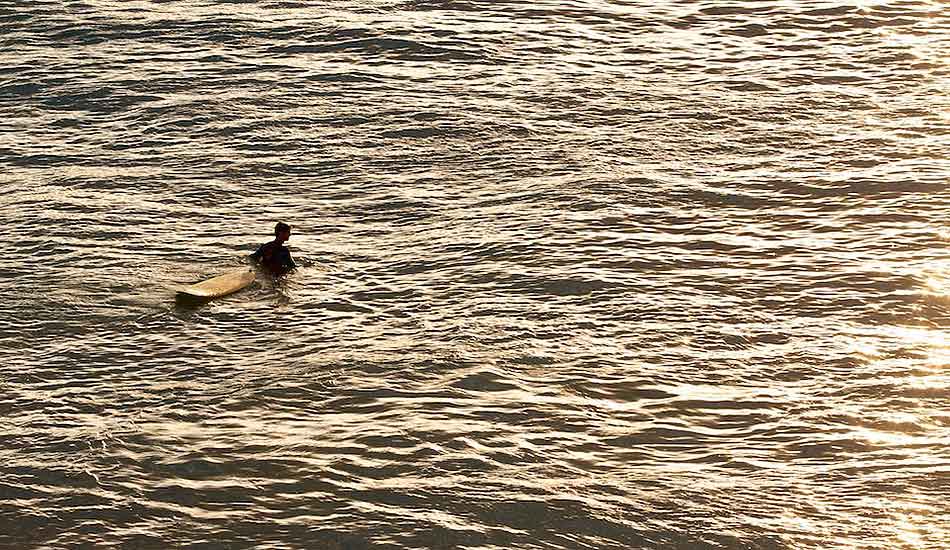 First guy out under some golden morning light. Photo: <a href= \"https://bayflare.com/\" target=_blank>Rhydian Thomas.</a>