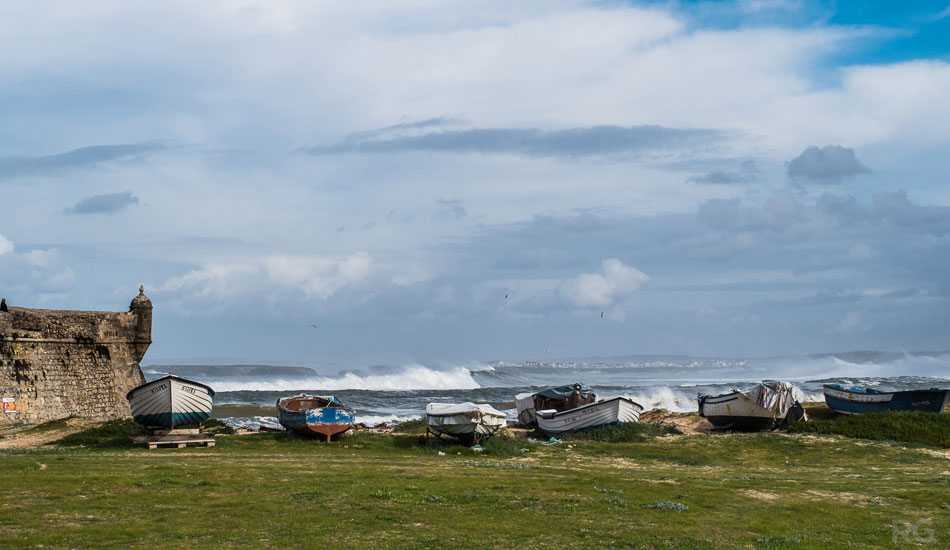The fishermen at Baia said they\'ve never seen such huge waves on the island in the background of this shot. Photo: <a href=\"https://www.surfatlisbonfilmfest.com\">Ricardo Gonçalves</a>