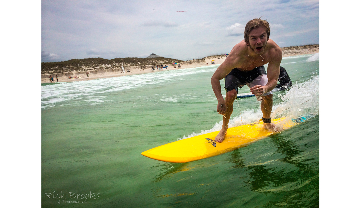 Conor Lynch, visiting from Philadelphia, was pleasantly surprised to find surf in Panama City Beach. Photo: <a href=\"https://richbrooksphotography.squarespace.com/\">Rich Brooks</a>