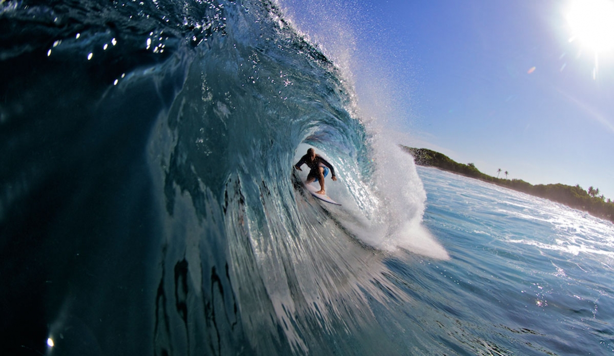 This shot epitomizes a nice day’s surf in the Maldives. A nice sized, perfect shaped, sunny day in front of an empty palm-fringed island. Photo: <a href=\"https://richardkotchphotography.com/\">Richard Kotch</a>