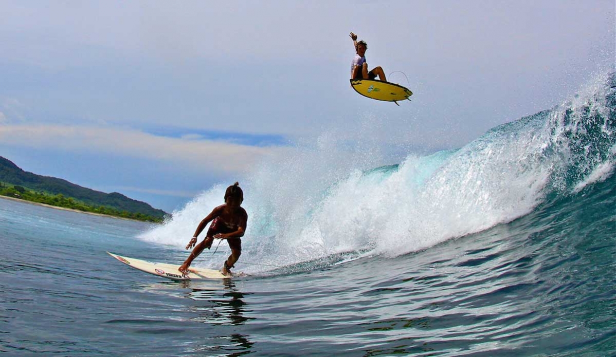 Still one of my favorites and the first surf shot I had published. This is Reubyn Ash flying high over Lakeys grom, Finda. Photo: <a href=\"https://richardkotchphotography.com/\">Richard Kotch</a>