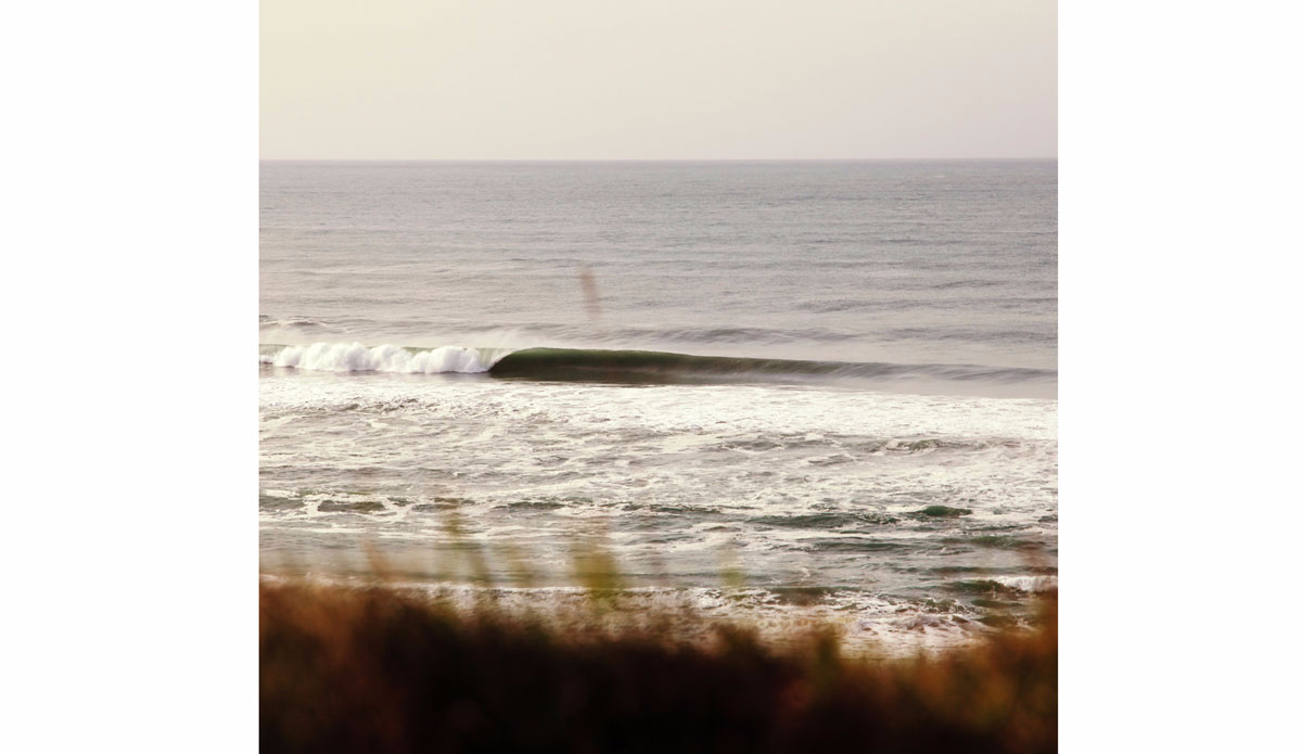 Perfect left point. Photo: <a href=\"https://www.simonjayphotography.com/\">SImon Rickwood</a>