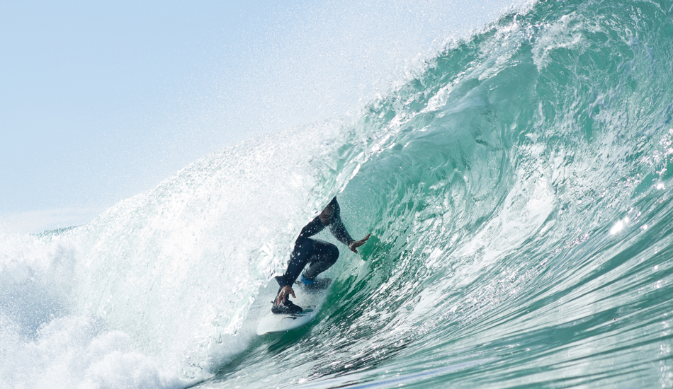 Rob Machado getting some tube time. I like his hand placement, just inches off the water. Image: <a href=\"https://www.kevinroche.com/\" target=\"_blank\">Roche</a>