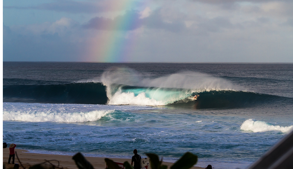 Taj Burrow pulling into a perfect barrel during an epic Pipe Masters. Photo: <a href=\"https://www.surfingeye.com/\" target=_blank>Ronald Hons</a>.