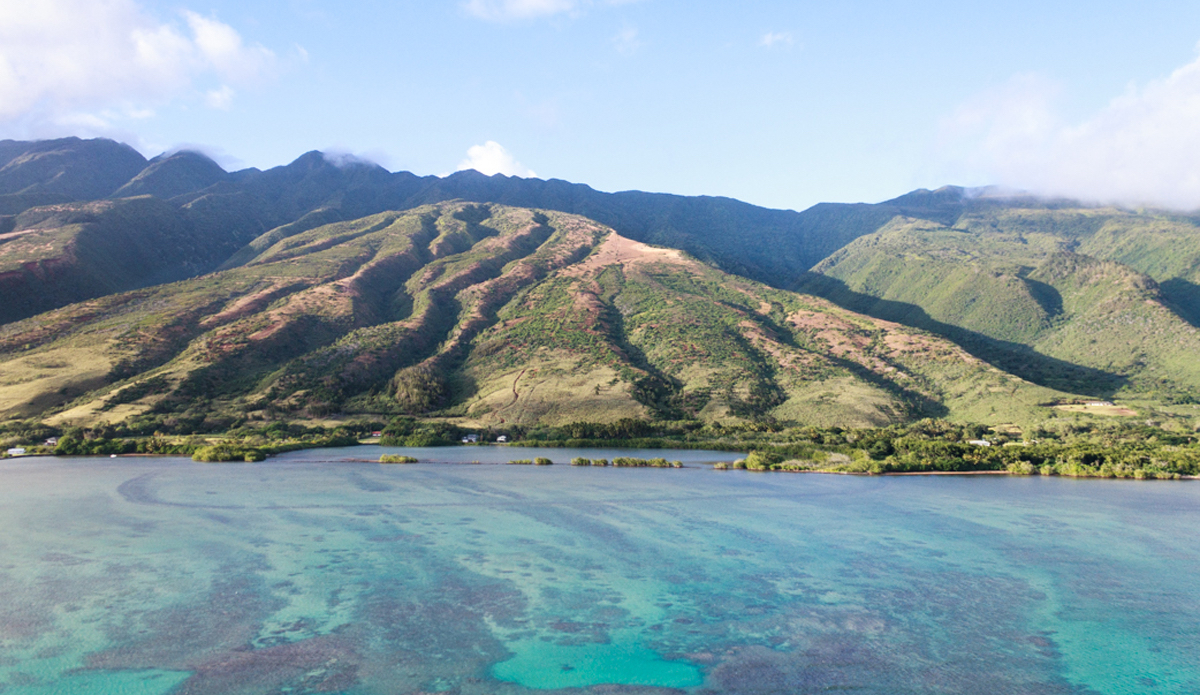 Flying over Maui\'s neighbor Moloka\'i. The Palilolo Channel is 8.5 miles from Maui to Molokai. Canoes of all types have, for years, have been enjoying the downwind run from West Maui to South Moloka’i. <a href=\"https://www.rookemedia.com\">Tyler Rooke</a>