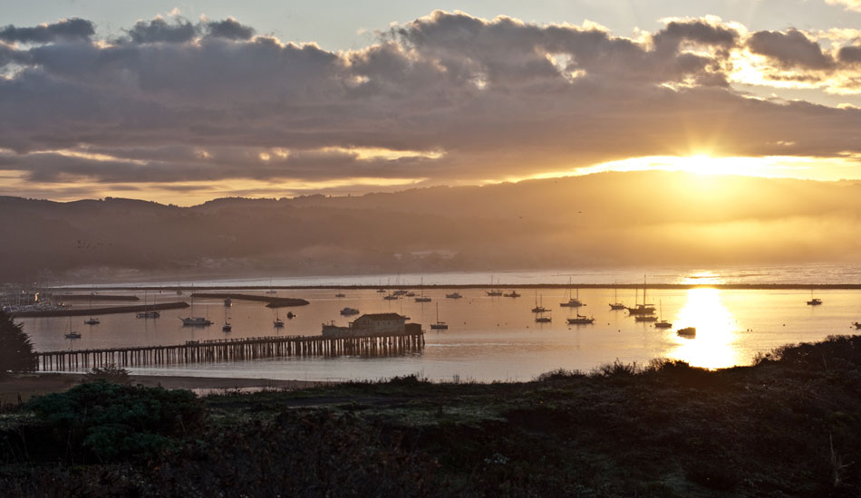  Dawn, lighting up Half Moon Bay Harbor, as seen from the lookout over Mavs. Photo: Rusty Long