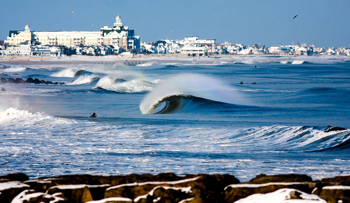 This image was taken about three years ago, when I first started shooting surf photos. Before there were 50 people shooting lineup photos from the beach. It was a picture perfect day, as you can tell. Sunny, eight inches of snow, glassy offshore winds, and good swell. Photo: <a href=\"https://www.ryanmackphotography.com/\">Ryan Mack</a>