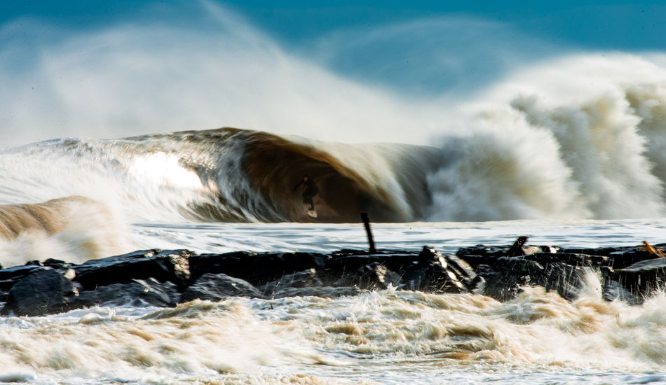 Travis Beckman, speed blur during December\'s doomsday swell. Photo: <a href=\"https://instagram.com/ryanmackphoto\">Ryan Mack</a>