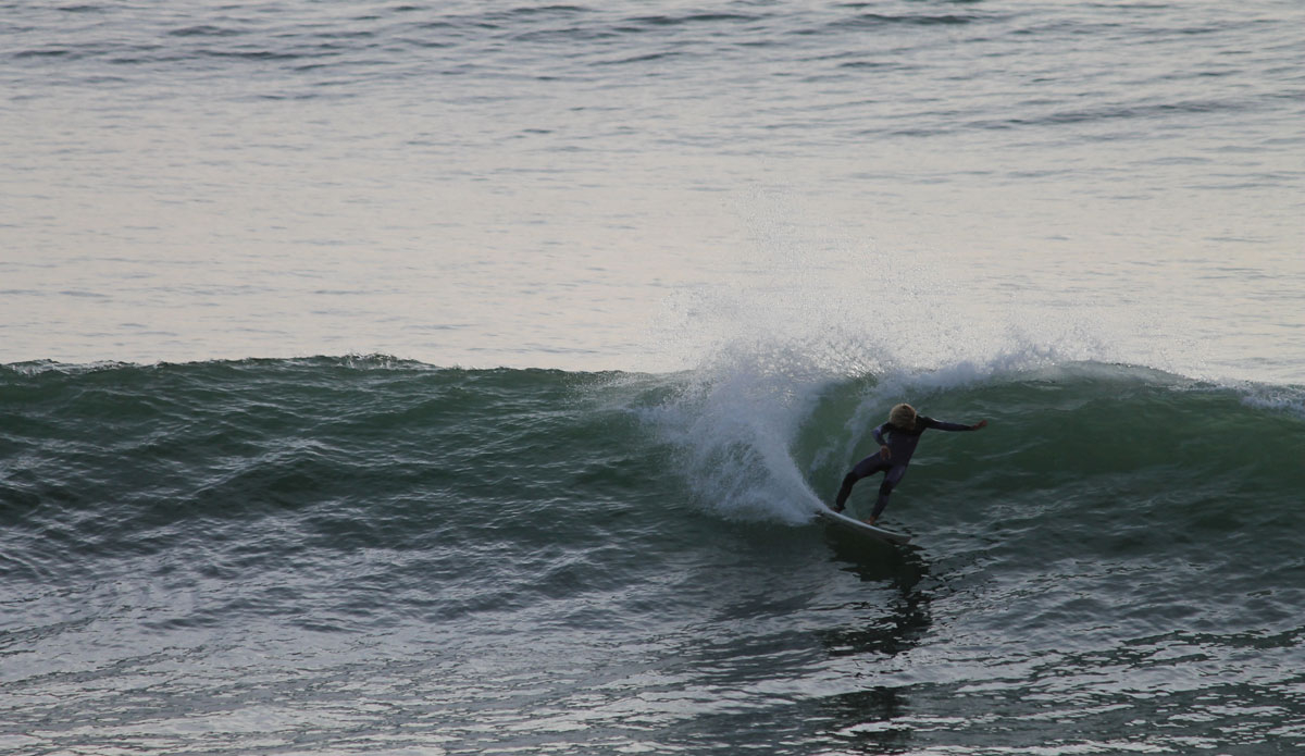 One of the many Moroccan locals who have most points completely dialed. 117- Two surfers decide to share one of the better sets of the day. Photo: <a href=\"https://www.ryanwattersphoto.com/\">Ryan Watters</a>
