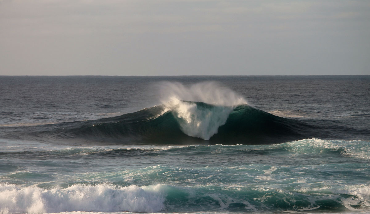 Triangular barrels unloading with nobody around. This entire day I didn’t even see another surfer. Photo: <a href=\"https://www.ryanwattersphoto.com/\">Ryan Watters</a>
