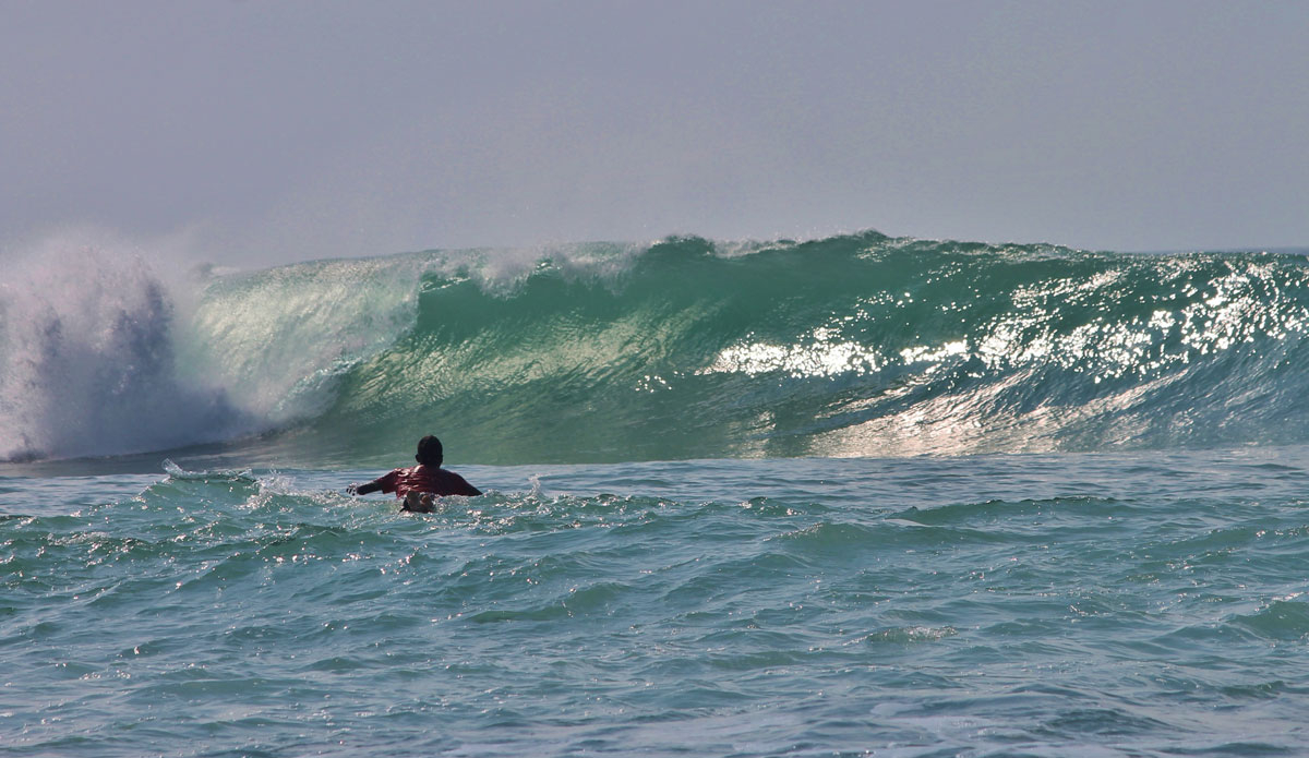 The hardest decision of the day was deciding between this left or the right across the channel. A young local opts makes his pick. Photo: <a href=\"https://www.ryanwattersphoto.com/\">Ryan Watters</a>