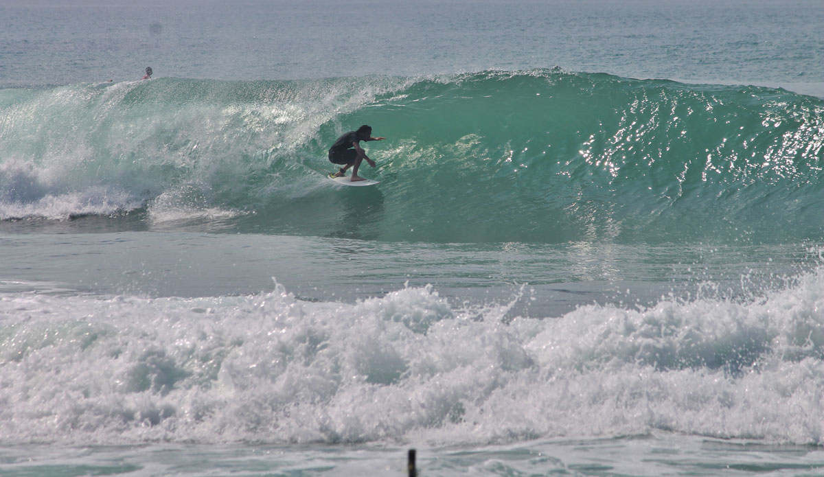 Another surfer is rewarded with his choice at the left slab. Photo: <a href=\"https://www.ryanwattersphoto.com/\">Ryan Watters</a>
