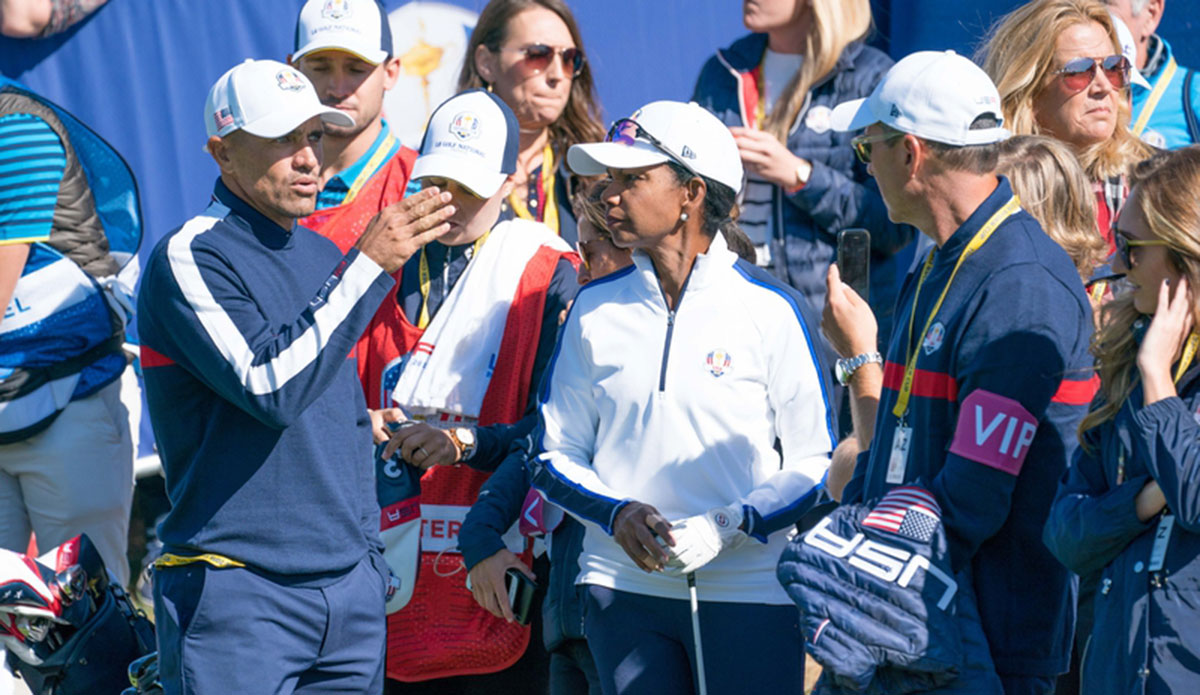 Kelly Slater and Condoleezza Rice talking golf. Image: Darren Carroll/PGA of America/Ryder Cup