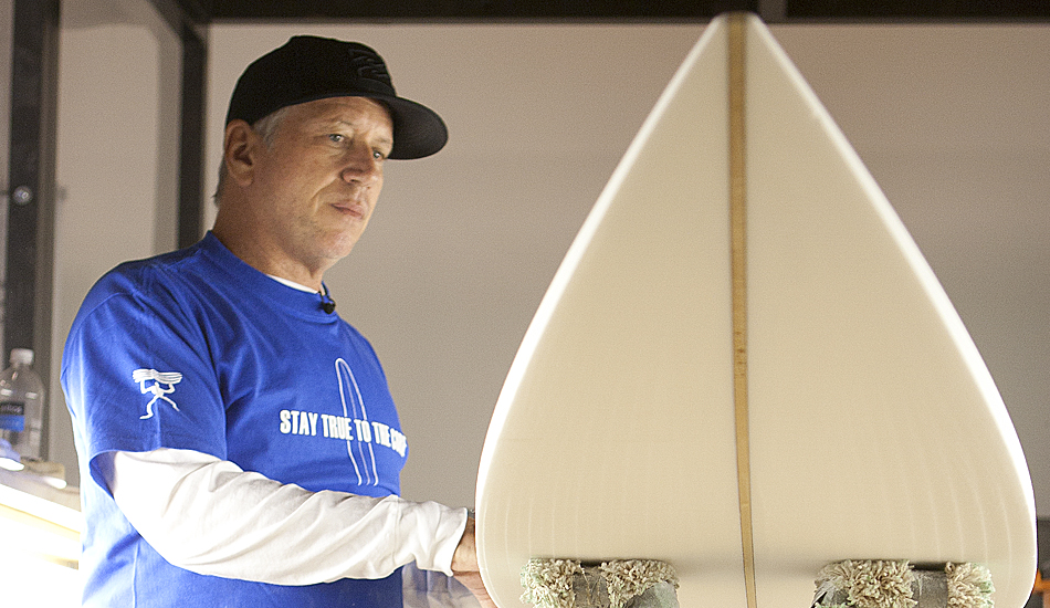 Shaper Pat Rawson shaped a Waimea gun as part of Shapers 4
Humanity at Sacred Craft. The boards from the Shapers 4 Humanity exhibition will be auctioned off with 100% of the proceeds going to SurfAid International. Photo: Maggie Yount
