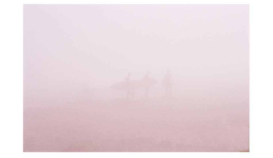 Purple Portugal Fog. I took this polaroid in Peniche, Portugal. It was 7 am, 55 degrees and drizzling. I was about to get grouchy about the weather when I saw these figures emerging from the fog. I threw everything I was carrying down and started shooting. It shut my mind up for the rest of the trip. I was in Portugal, surfing and taking pictures. Image: <a href=\"https://shehitpausestudios.com/\" target=\"_blank\">Schwartz</a>
