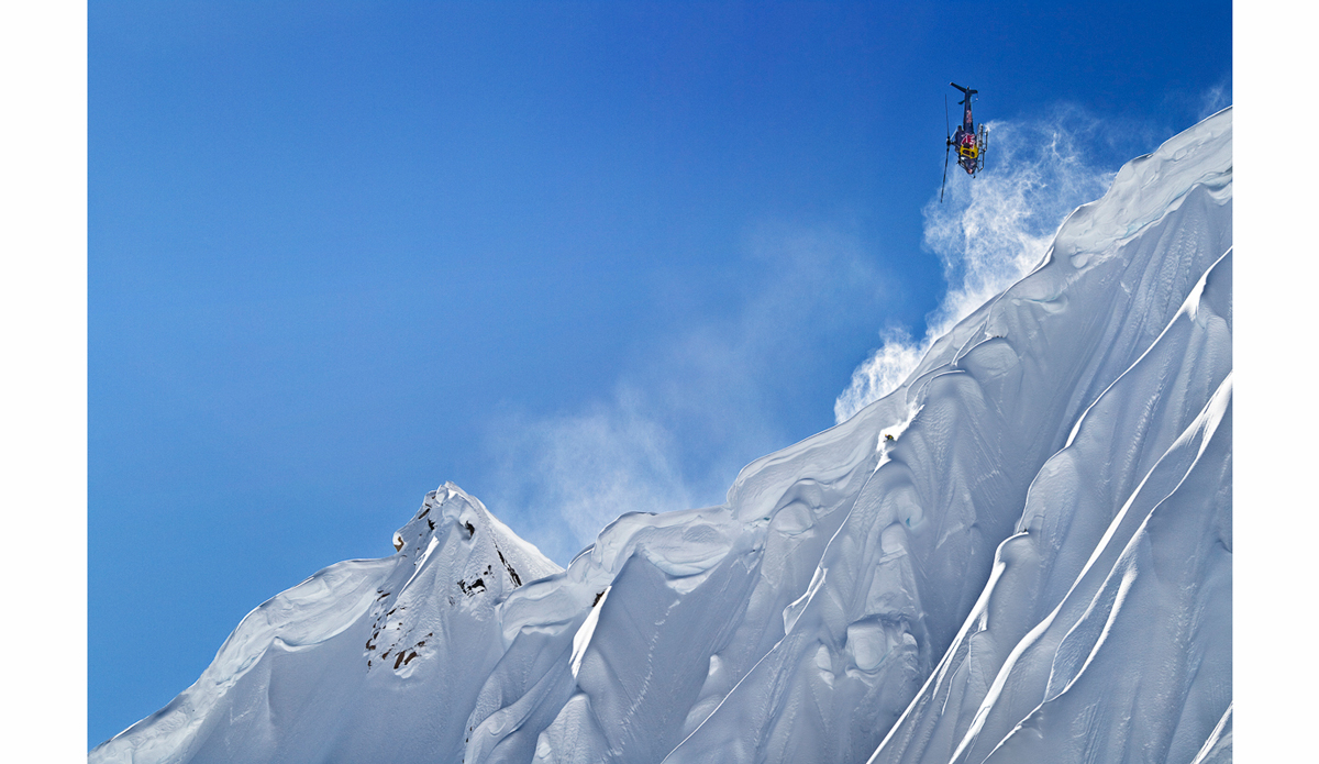 During the making of The Art of Flight I wanted to incorporate a shot of the helicopter into a photo of John Jackson riding a line. I wasn\'t expecting the pilot to get so aggressive. Photo: <a href=\"https://scottserfas.com/\">Scott Serfas</a>