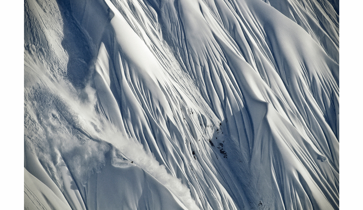 Because of weather great days like this are few and far between but when the clouds part there is no where else I’d rather be. Travis Rice, Alaska. Photo: <a href=\"https://scottserfas.com/\">Scott Serfas</a>