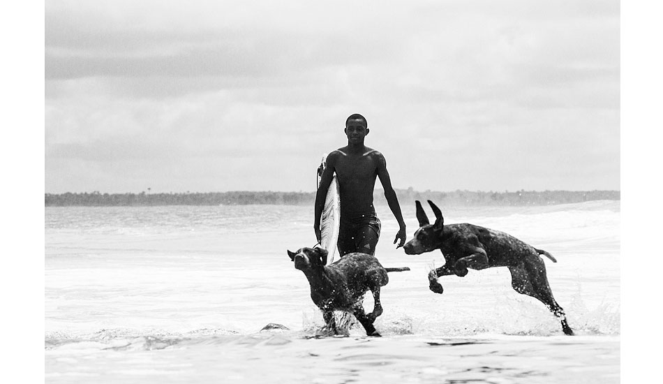 Claudius strolling back up the point in between waves. Photo: Sean Brody