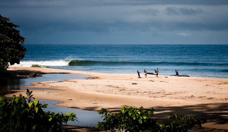 In some parts of West Africa they still catch fish using dug out canoes built from giant trees, which take six months of chiseling to hollow.  They wait to see the birds on the horizon and then about six men jump in the canoe, paddle out, and drop the net, while the rest of the village pulls the net in.  They do this everyday to survive. Photo: Brody/<a href=\"https://www.surfresource.org/\" target=_blank>SurfResource.org</a>