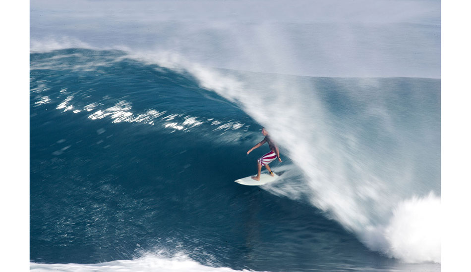 I\'ve always been drawn to create differently to others, especially when those others are on the beach creating alongside of me. With literally dozens of other big lenses on the beach, one knows that most are simply capturing the moment at the standard 1000th of a second or there-abouts. I like to capture the velocity; the angle of trajectory even. 
This can be done by using a much, much slower shutter speed (in this case; 1/50th of a second). Because the camera shutter is effectively open 20 times longer than at 1000th of a second, you are capturing 20 times longer exposure. You\'re capturing a lot more, which equates to speed. I know from the nature of working with such slow shutter speeds that not one other photog\' on that beach had exactly the same image as me, even if others there were also dabbling with slower shutter speeds.  The end result is that I get the unique shot out of the bunch. Don\'t be afraid to mix it up and try different technique. It will help to define your own signature style. Photo: <a href=\"https://seandavey.com//\" target=_blank>Sean Davey</a>