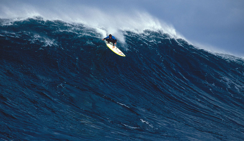 As a developing photographer in Australia, I had befriended a Brazilian magazine editor named Rosaldo Cavilcanti. We have worked together on many things over the  years.  This one year, he was going to the Todos Reef Event in \'98 as the coach of the Brazilian team, made up of Carlos Burle and Rodrigo Resend. They both charged their hearts out and Carlos won the event over all. Total legend. It was my first time shooting truly enormous waves from a boat. This was pre-Teahupoo (by three or four years for me), and I just remember thinking that it was so cool to be able to roam a large lineup with huge waves, continually changing up your perspective, not to mention the excitement factor. Photo: <a href=\"https://seandavey.com//\" target=_blank>Sean Davey</a>