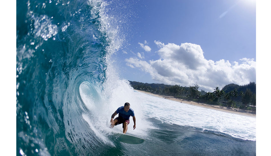 I was out shooting water shots with the fisheye one morning at 2-4 foot Rockies.  what made it magic was the glassiness of the water - hardly a breath of wind on it. Those are often the best days for getting really cool water shots. Shane Beschen was out and boosting huge airs, one right past me. Jack Johnson was also out enjoying the mellow glassy vibe. I had just shot him as he passed me in a tight barrel when a certain person who shall remain un-named and who I was working with but not for at the time, was barking orders at me to go and shoot the Volcom groms on the lefts. Jack yells back  \"Beat it, can\'t you see we are trying to get a cover here?\" And I thought to myself, \"Ah yeah, why would I want to leave this productive session right now to take a chance on a different shoot that might not produce? Sometimes you\'ve just got to stick with what you\'re doing despite outside forces. Photo: <a href=\"https://seandavey.com//\" target=_blank>Sean Davey</a>