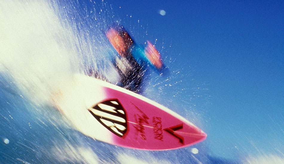 From much earlier in my career, probably mid \'80s – \'84, perhaps. They had a Gorilla Grip team event at Bronte and Tamarama beaches, and this was when teams were really heavy with name surfers.  Mereweather was one of these with MR and Nick Wood, who was blowing up at the time. Also Simon Law and Matt Hoy representing. I knew that the pro\'s would be out early in the morning,  getting their training in while the masses slept, so I got up early and swam with my old Nikoness II and Toshiba Flash. I was very much hunting an MR image. As a young surf photog\', that would be the ultimate to get a sick water shot of MR at that time. Sure enough, he was approaching me and I just steeled my resolve to get the shot and held my position. Mark told me later that he was starting to feel the fins letting go and was worried that he was going to run me over, but that the shot was very cool. It almost ran as the cover of Waves magazine, but was pulled by the publisher at the last minute. This really was early, early days for me in the use of flash to capture surfing, but it was all fun to be continually experimenting with different techniques. It helped to form my resolve to shoot different. That\'s one of my motos. Photo: <a href=\"https://seandavey.com//\" target=_blank>Sean Davey</a>