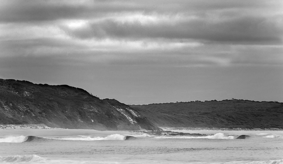 Unhindered March. A perfect lineup of unridden waves on King Island. Photo: <a href=\"https://seandavey.com//\" target=_blank>Sean Davey</a>