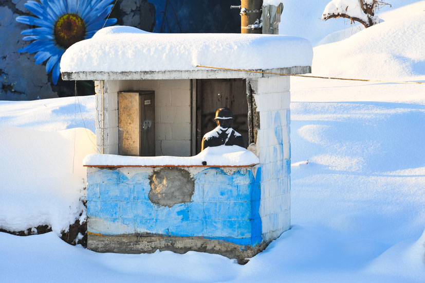 One of the ROK decoy stations. The plastic soldier is covered after a massive snowfall in January. Photo: <a href=\"https://www.shannonaston.com/\" target=_blank>Shannon Aston</a>.