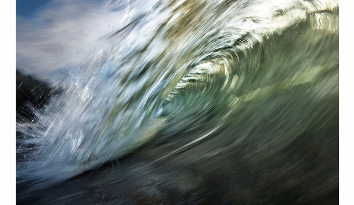 Barrel blur. Photo: <a href=\"https://beachbreakphotography.ca/\">Shayne Stadnick</a>