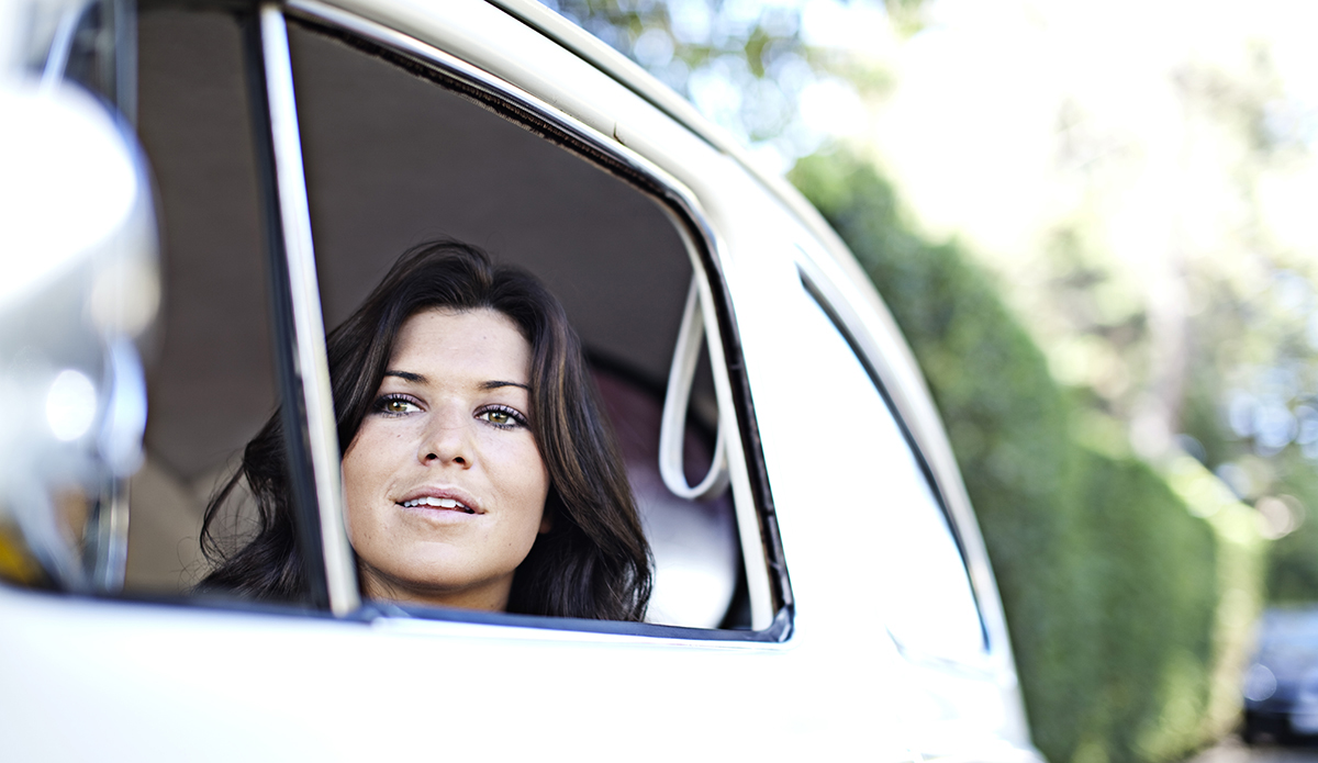 Alyssa Newman checks the surf near her house in Santa Barbara.  Photo: Sheldon Magner