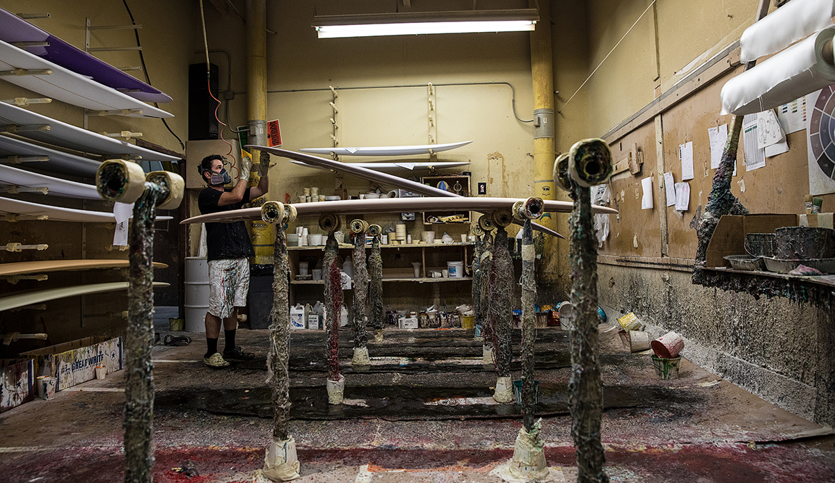 Ryan Martz hard at work in the lam room at The Watermans Guild. Santa Ana, CA.  Photo: Sheldon Magner
