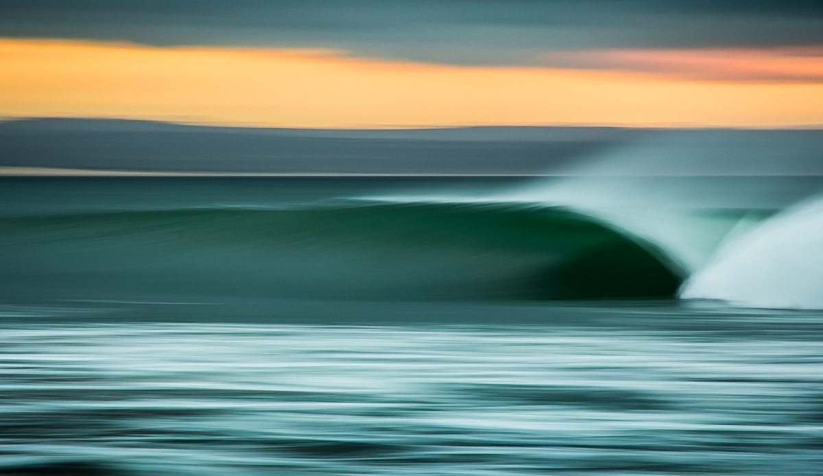 3/10 second: A perfect Supertubes barrel under a stormy sky. Photo: <a href=\"https://www.flickr.com/photos/7139710@N04/\">DeonLategan</a>