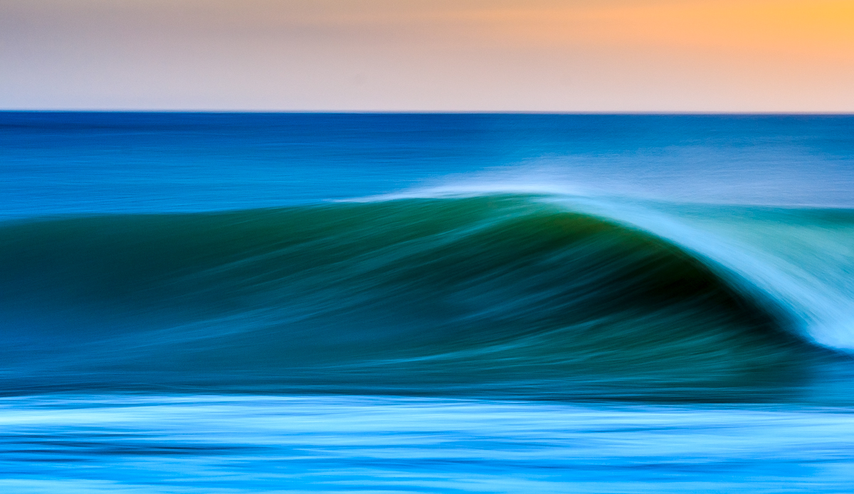 3/10 second: no whistles and bells - just a simple wave at sunrise. Photo: <a href=\"https://www.flickr.com/photos/7139710@N04/\">DeonLategan</a>