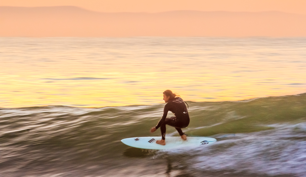 1/50 second: Derek Hynd flow and glow at dawn. Because he\'s finless, his lateral lines are perfect for shooting at slow shutter speeds whilst panning. Photo: <a href=\"https://www.flickr.com/photos/7139710@N04/\">DeonLategan</a>