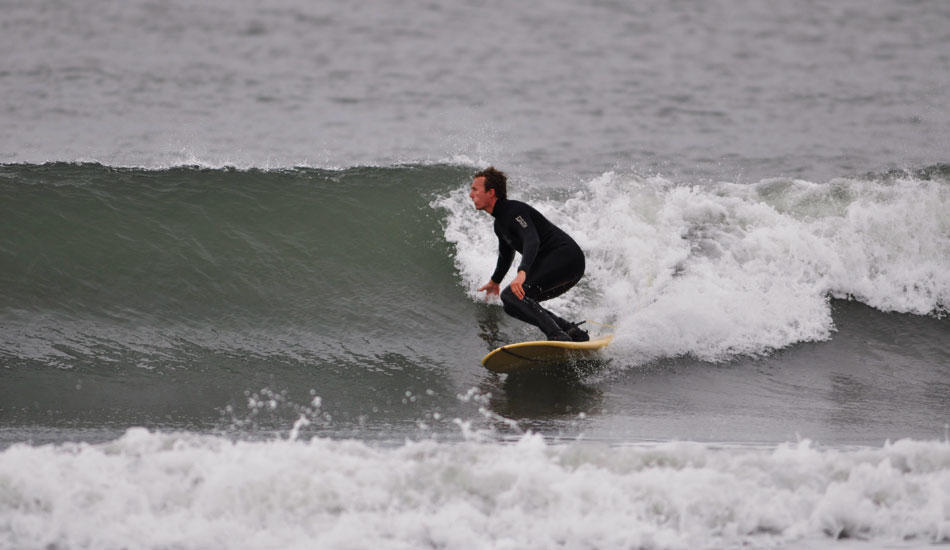 Kevin Cunningham puts his art to use at a Rhode Island beachbreak. Photo: Jo McGovern