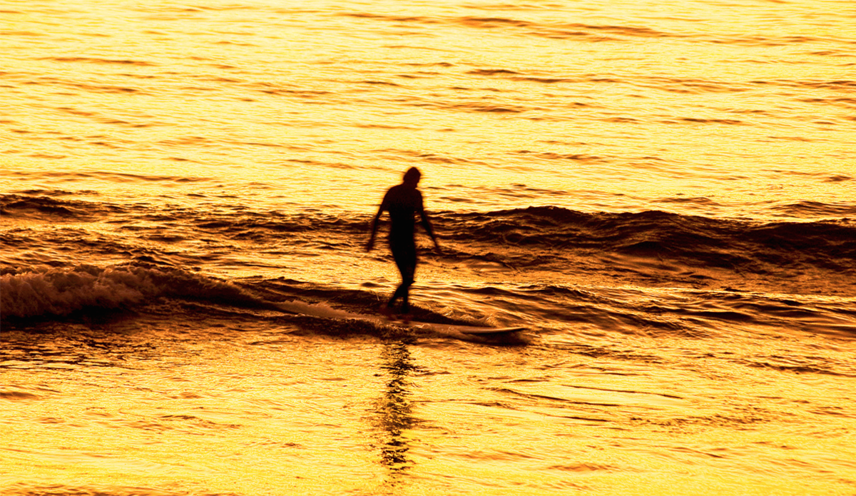 Hans Hagen gliding on gold in his hometown of Laguna Beach. Photo: <a href=\"www.kgfoto.com\">Katie Graham</a>