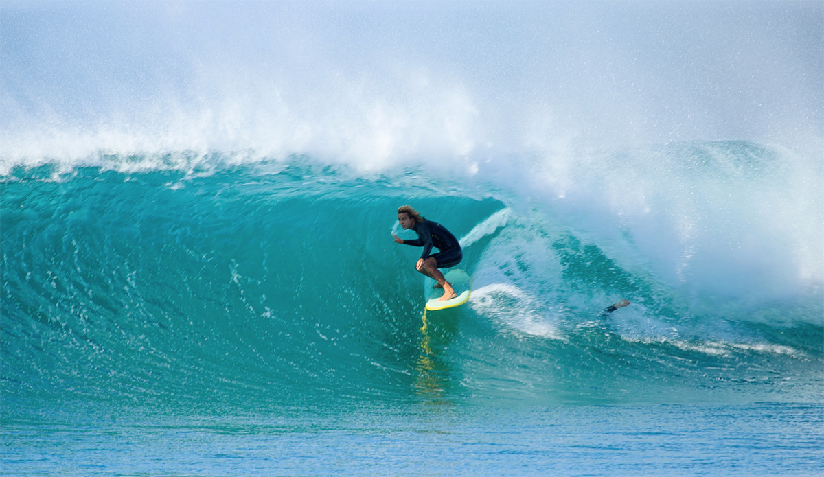 Alex Knost cruising through a Newport Beach perfect barrel. Photo: <a href=\"www.kgfoto.com\">Katie Graham</a>