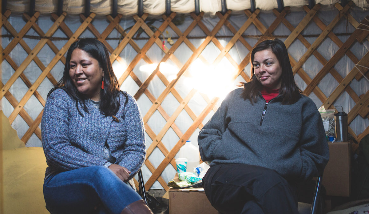 The organization of the protest camp runs deep. Here are two beautiful women we were fortunate to meet, Nicole and Melissa who help run a midwives organization that operates within the camp. A few weeks before we arrived, they delivered a baby on the grounds, and continue to offer services and support for women of the camp. Photo: Keegan Gibbs