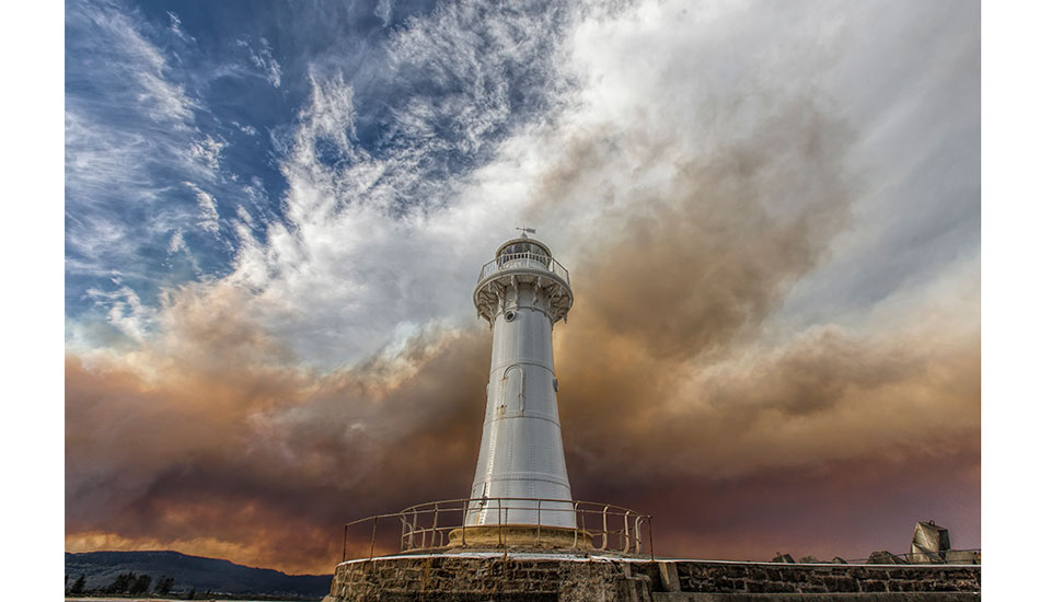 Recent Fires clouded over Wollongong’s Historical lighthouse. Photo: <a href=\"https://www.16images.com.au\">Steen Barnes</a>