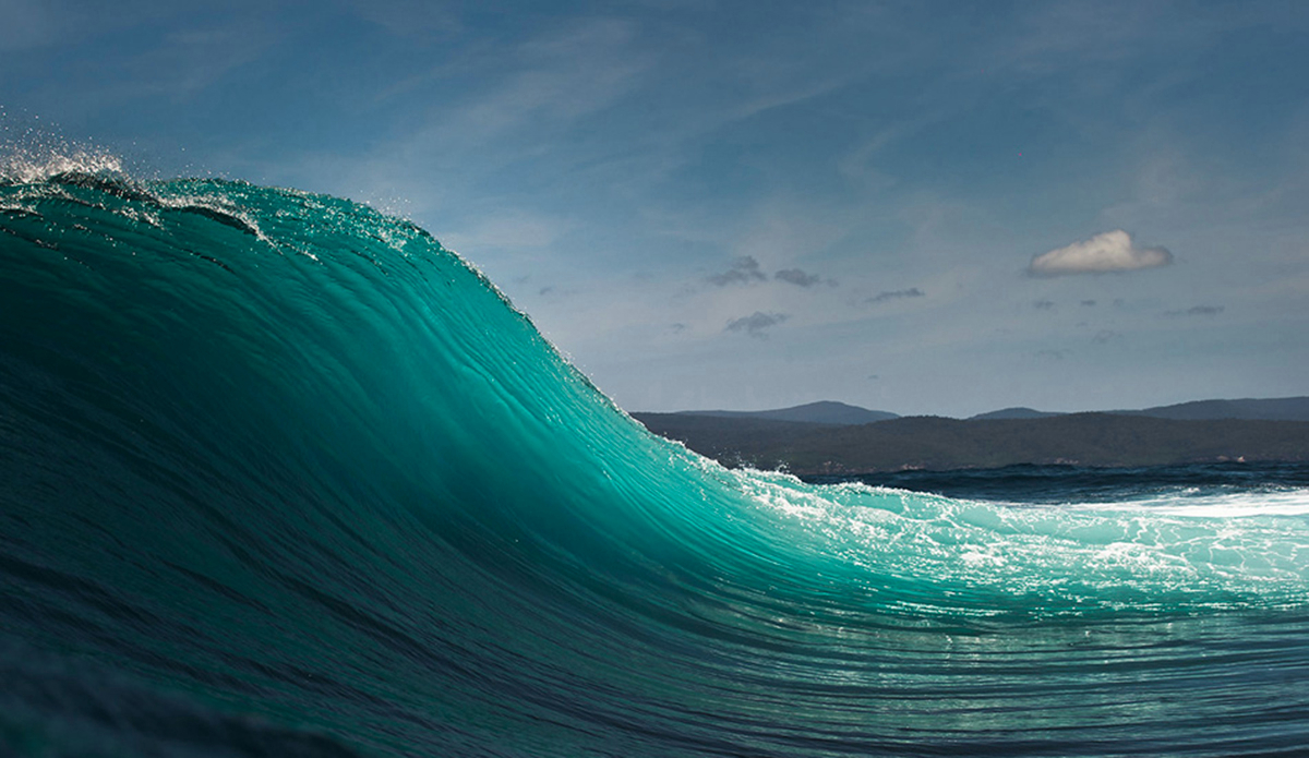 On a large storm swell a few months ago, we sat on a jetski under the cover of darkness hoping that light would bring rideable, perfect waves at this offshore spot. It certainly wasn’t perfect, nor all that rideable on many. What you can’t see is 10m behind us sits a dry rock ledge running up an island. Photo:<a href=\"https://www.stevewall.com.au/\">Steve Wall</a>