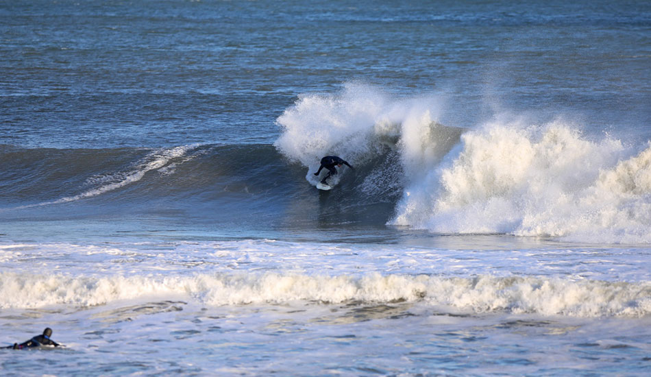 Rozbern Shaper, John Oppito, feeling out his rails backside on his newly shaped board. Photo: <a href=\"https://www.rozbernsurf.com\":> Kevin Strickland</a>