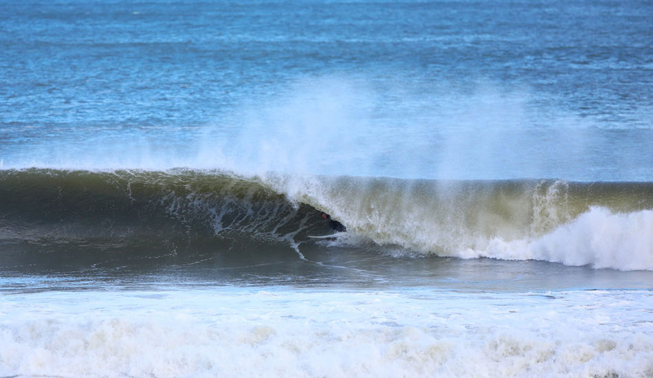 Monmouth County standout, Nick Menditto, logging some tube time. Photo: <a href=\"https://www.rozbernsurf.com\":> Kevin Strickland</a>