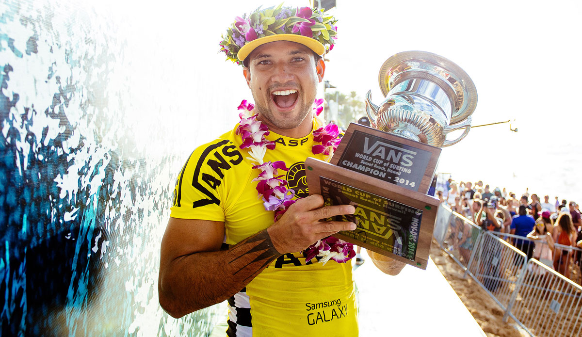 Michel Bourez of Tahiti (pictured) holds his trophy after winning the Vans World Cup of Surfing at Sunset Beach, Oahu, Hawaii on Friday December 5, 2014.  Bourez produced a near perfect performance, scoring an 18.13 heat total (out of a possible 20.00), defeating Dusty Payne (HAW), Sebastian Zietz (HAW) and Ian Walsh (HAW). Photo: ASP / Sloane