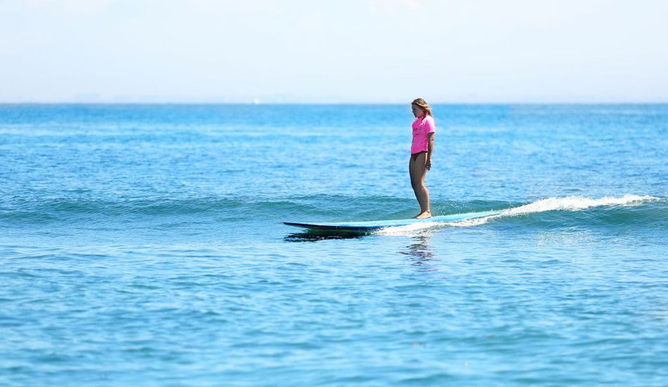 Cruising on the mini-waves. Photo: Emily Goodman