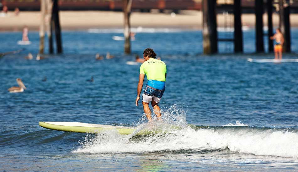 Tom Curren surfed a 12-foot paddleboard to help Santa Cruz Syndicate win. Photo: Steven Lippman/ Ricky Lesser