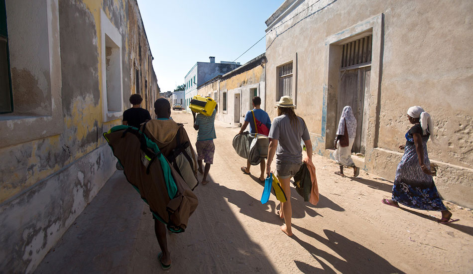 Making our way through the sandy streets of Stone Town on the Ilha de Moçambique, to take a boat to the outer islands. Photo: <a href=\"https://www.facebook.com/pages/SurfEXPLORE/153813754645965\">surfEXPLORE</a>/John Seaton Callahan