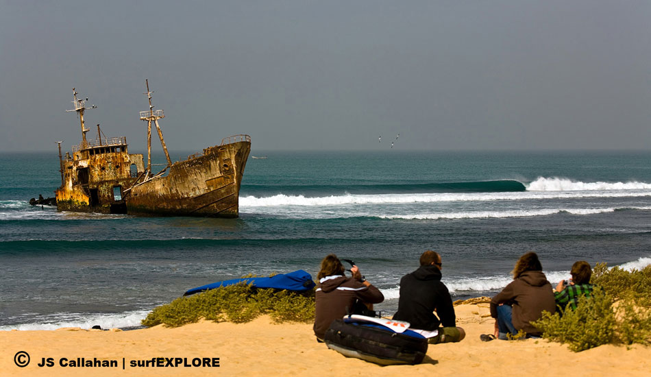 Mauritania. The area around the Nouadhibou Peninsula is known as
the shipwreck capital of the world as it is littered with hundreds of rusting wrecks, which were driven ashore as part of insurance scams. This hulk sits in the middle of a great right point. Photo: John Seaton Callahan/surfEXPLORE