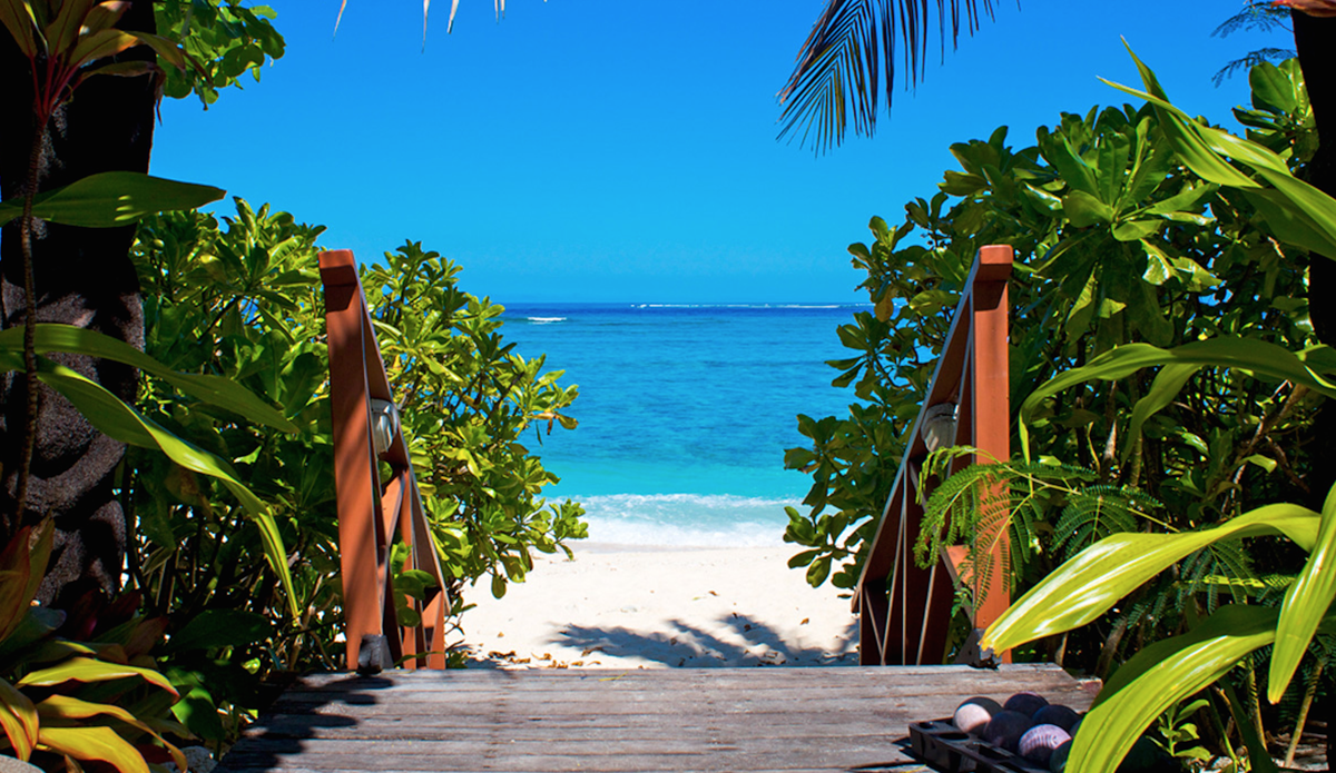 A typical view for most of the 330 islands in Fiji, but this one happens to be second closest to Cloudbreak. Photo: <a href=“ www.rookemedia.com”>Tyler Rooke</a>